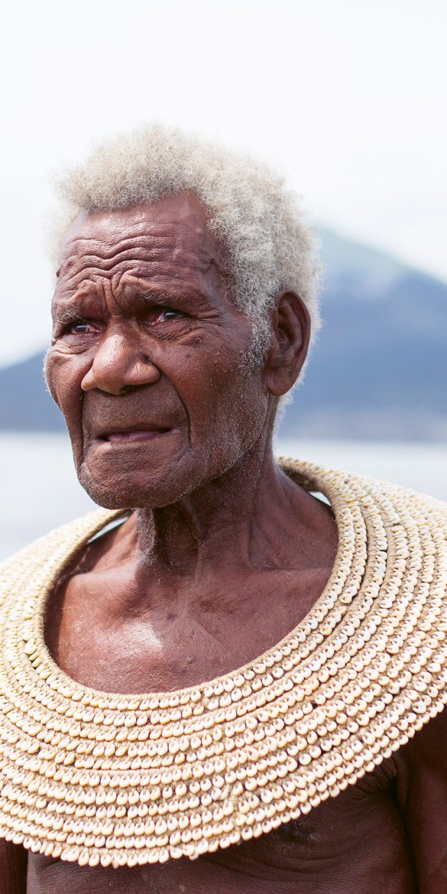 Damien Kereku wearing a Midi, Matupit, Papua-Neuguinea